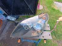 Opel Astra H lampa przednia lewa Hella