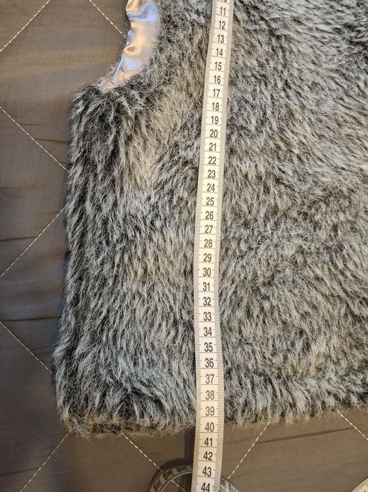 Тепла жилетка для дівчинки(8-10 років)