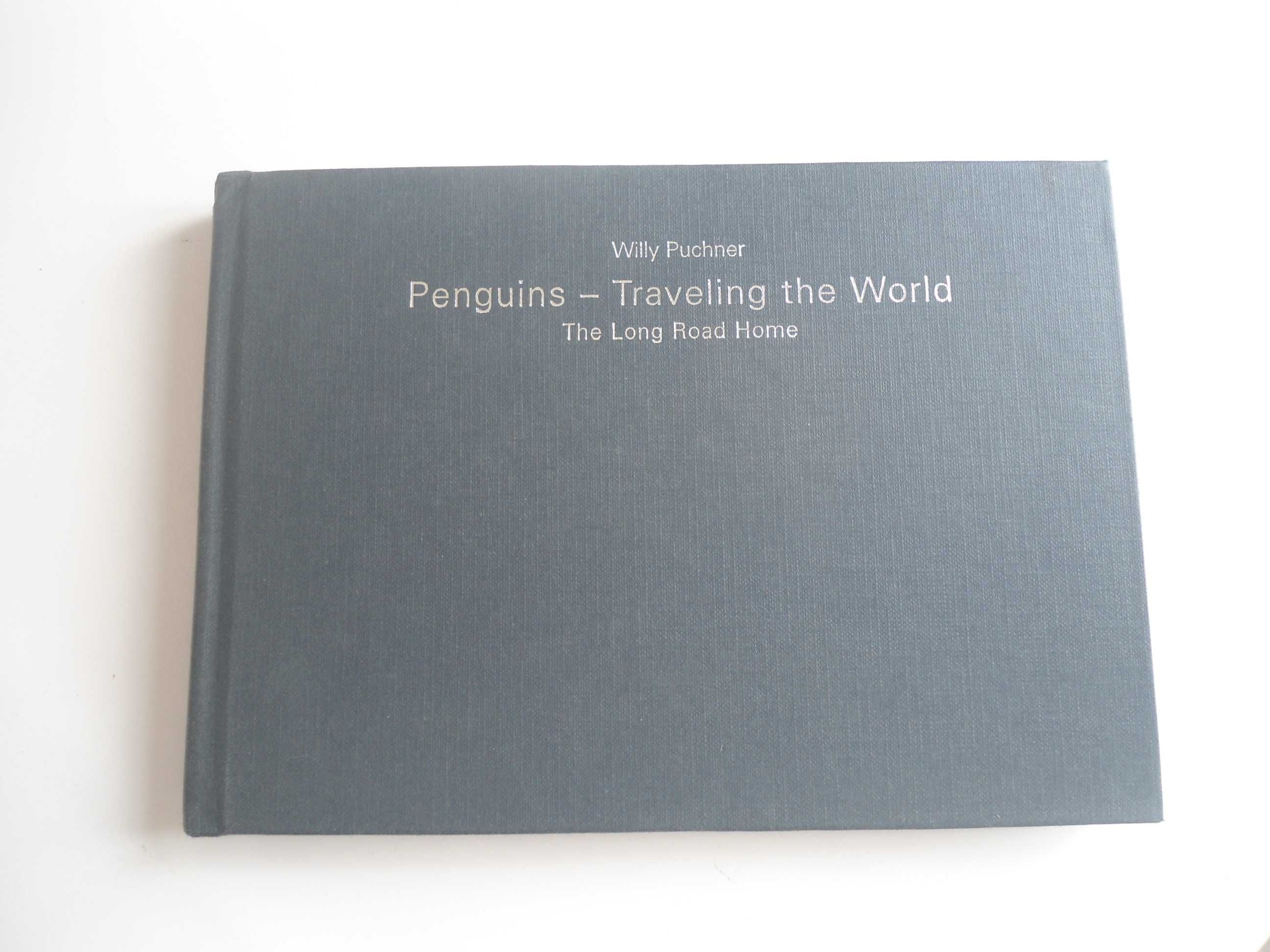 Penguins-Traveling the world-The Long road Home de Willy Puchner