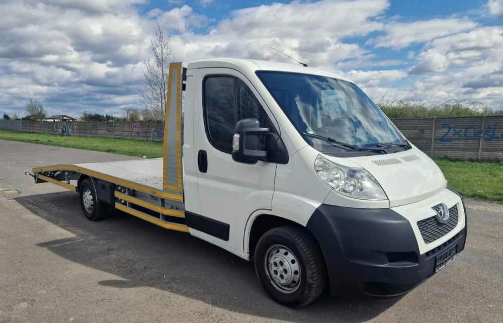 laweta autolaweta holowanie pomoc drogowa od 2.5 za km transport