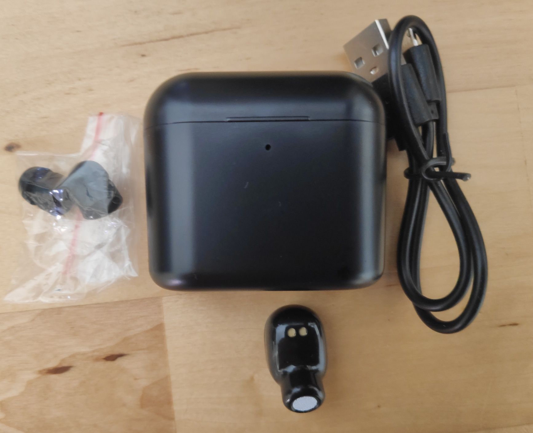 Mini fones Bluetooth sem fio.