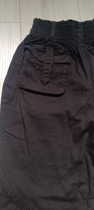 Spodnie z łańcuszkiem nowe 158