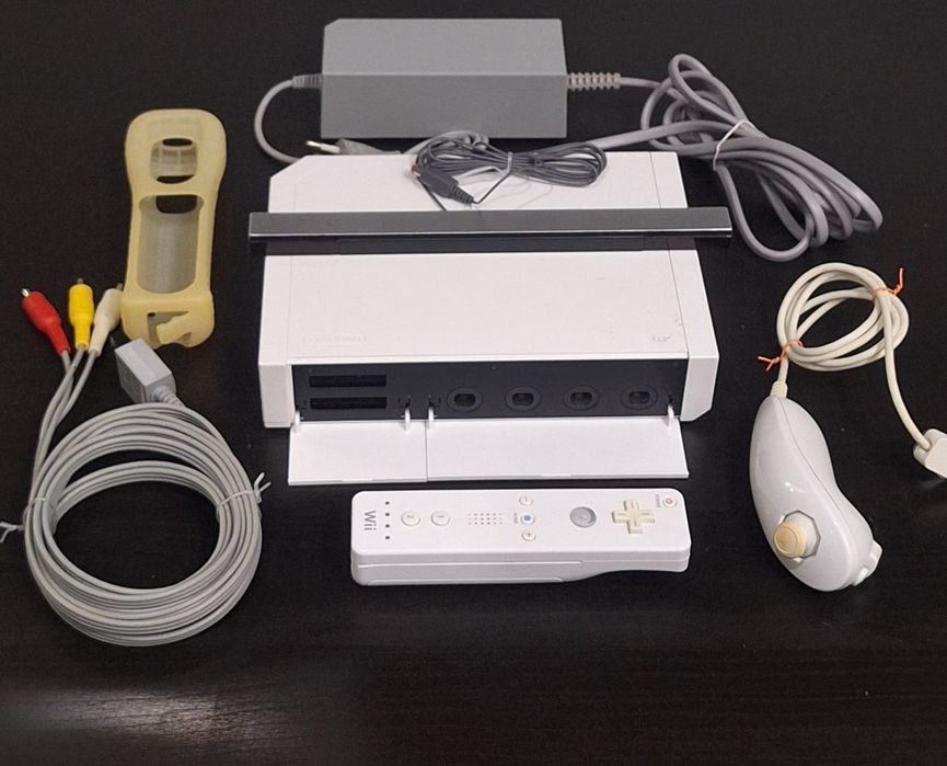 Vendo consola Nintendo Wii com vários jogos.