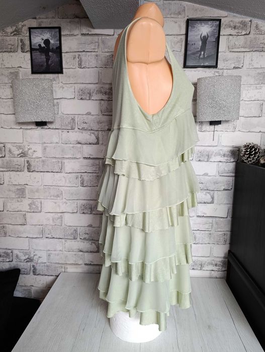 pistacjowa szałwiowa sukienka falbanami L letnia maskuje oponkę brzuch