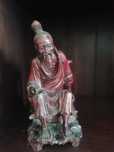 Escultura antiga oriental em madeira exótica