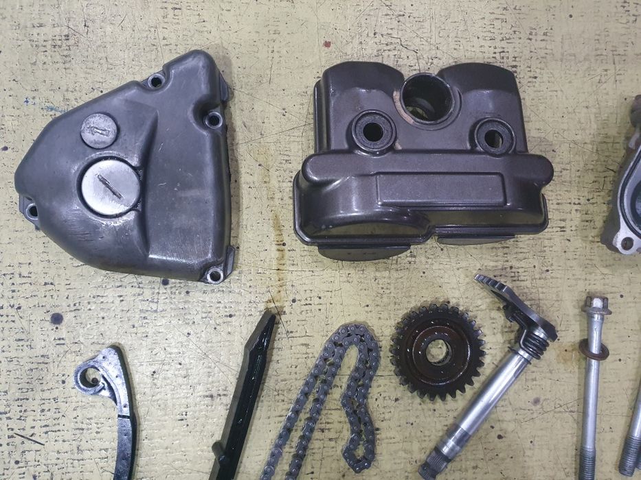 Silnik Suzuki RMZ/KXF 250  części 4T 06r pokrywy króciec mech. kopki