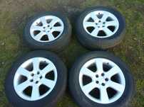 HYUNDAI SANTA FE II koła felgi opony wielosezonowe 235/60 R18