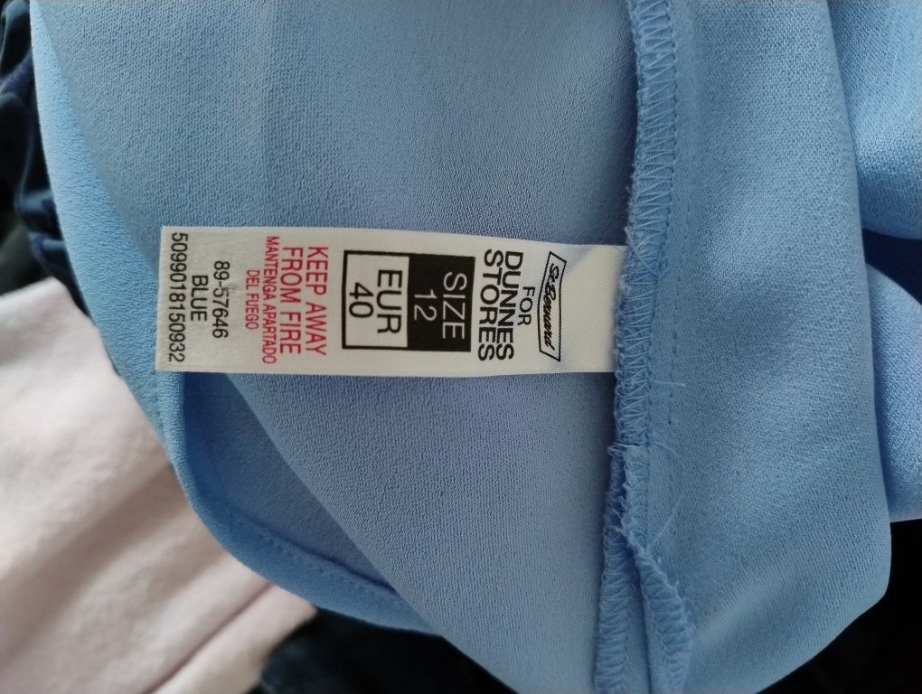 Elegancka błękitna bluzka z krótkim rękawem