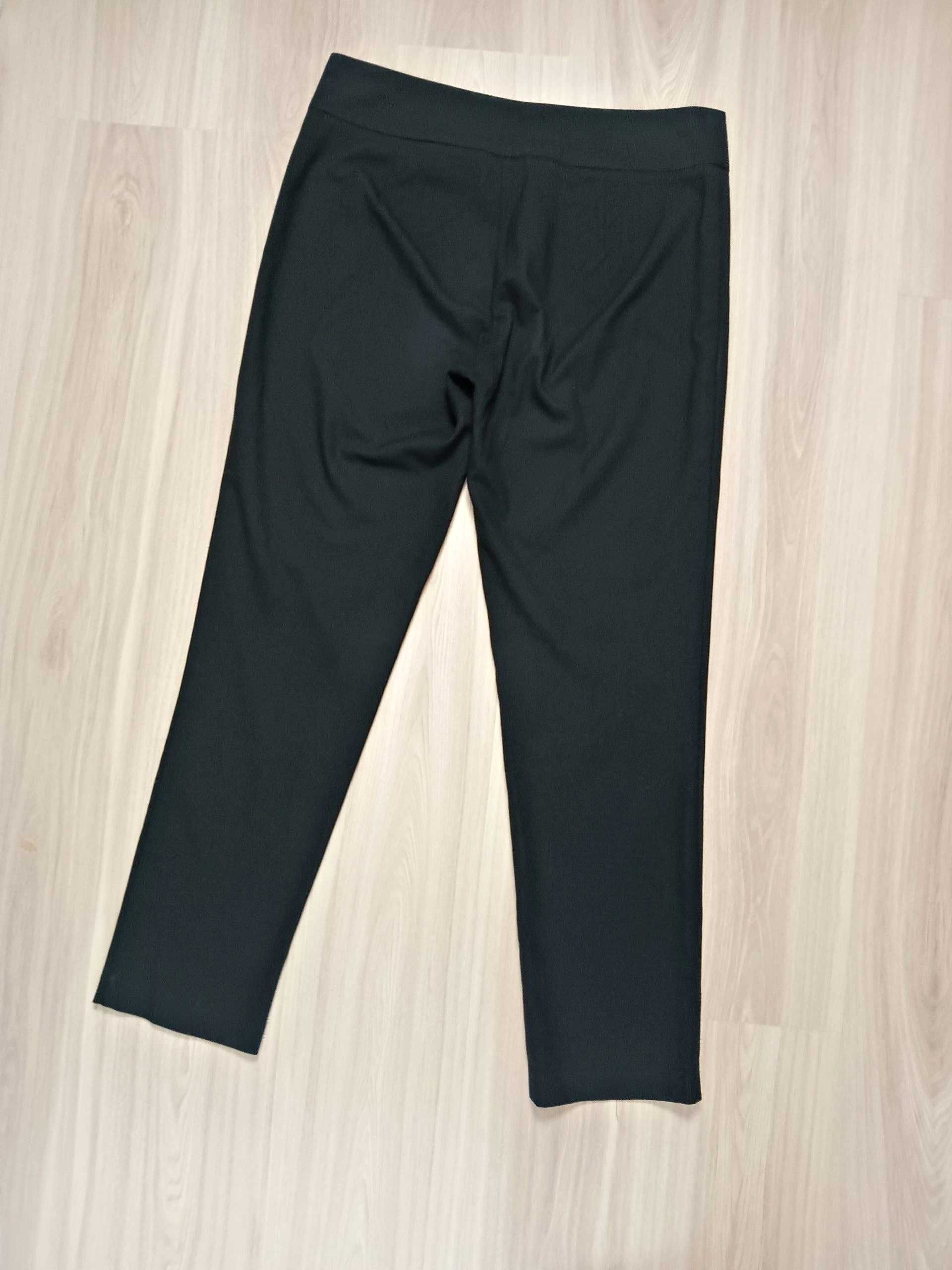Damskie spodnie garniturowe czarne Jacqueline Riu 44