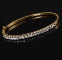 Женский золотой браслет с бриллиантами