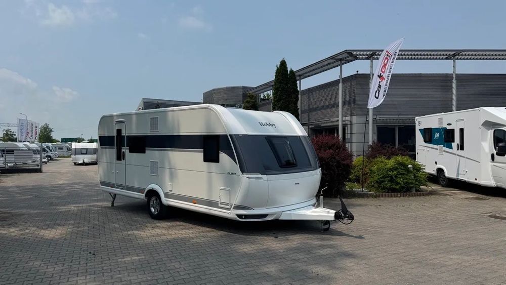 Hobby 560 KMFe De Luxe  DMC 2000kg | Łóżko piętrowe | Truma Combi | 750 cm długości