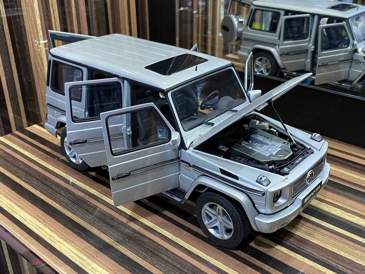 Модель авто мерседес G55 AMG Autoart