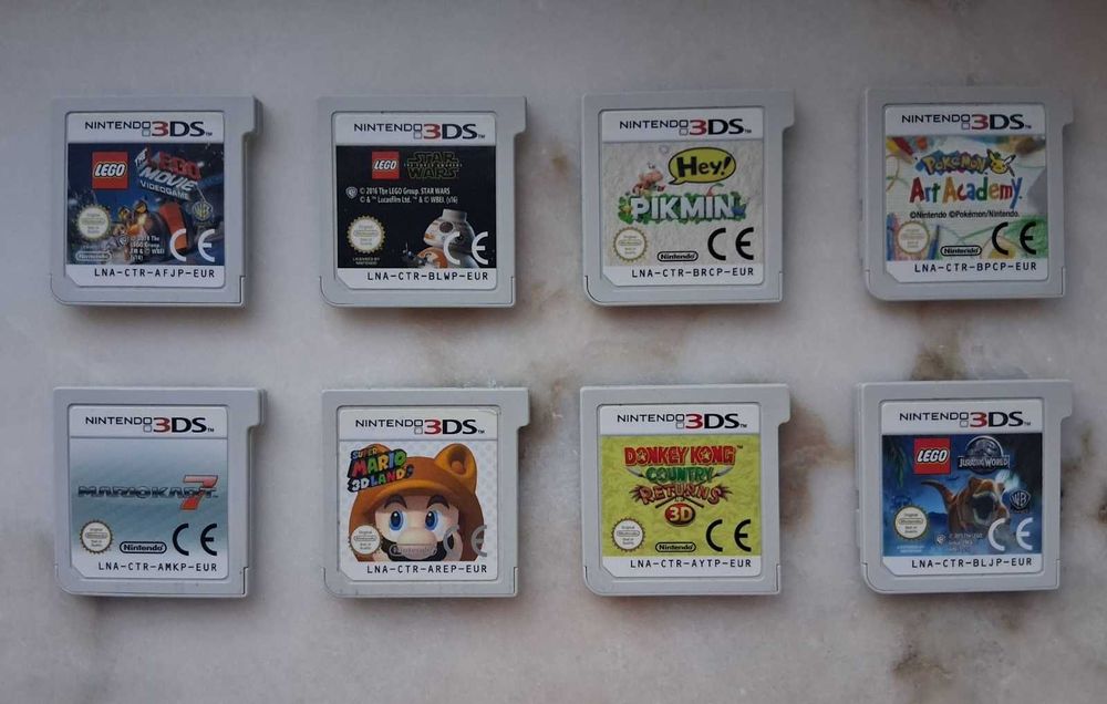 Nintendo 2DS Pokémon Sun/Moon Azul + 8 Jogos + Carregador + Estojo