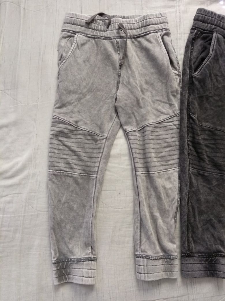 joggersy 110 H&M 4 sztuki joggery zestaw komplet spodnie dresowe