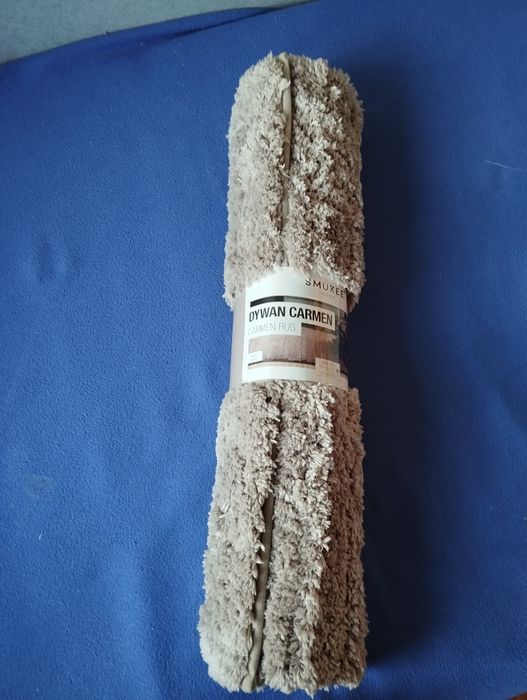 Beżowy puszysty dywanik 65x100 cm Nowy