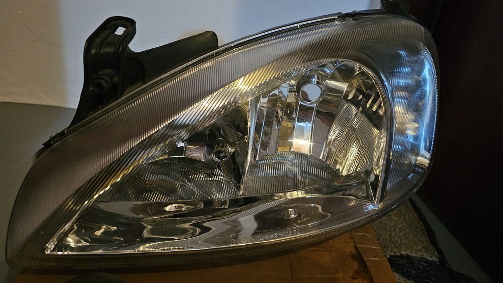 Óptica esquerda Corsa C