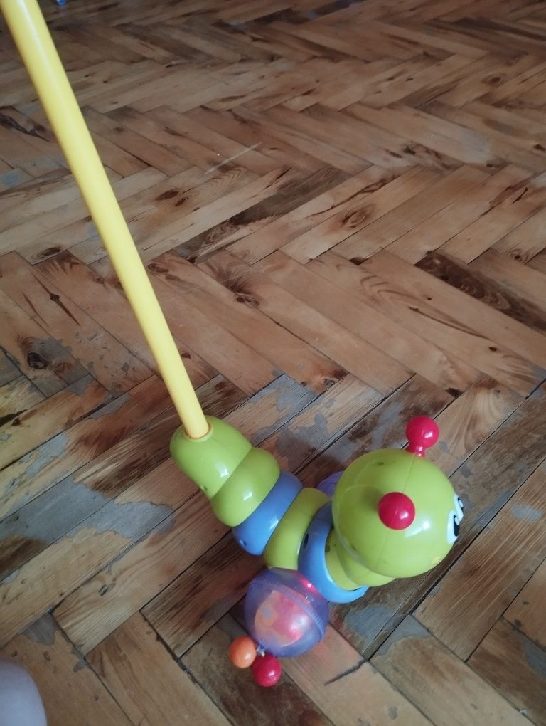 Іграшка гусениця на палиці