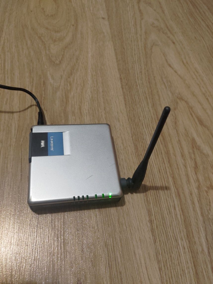Router Linksys + zasilacz