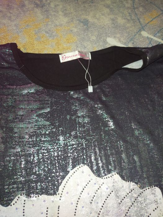 Nowa elegancka bluzka z krótkim rękawem