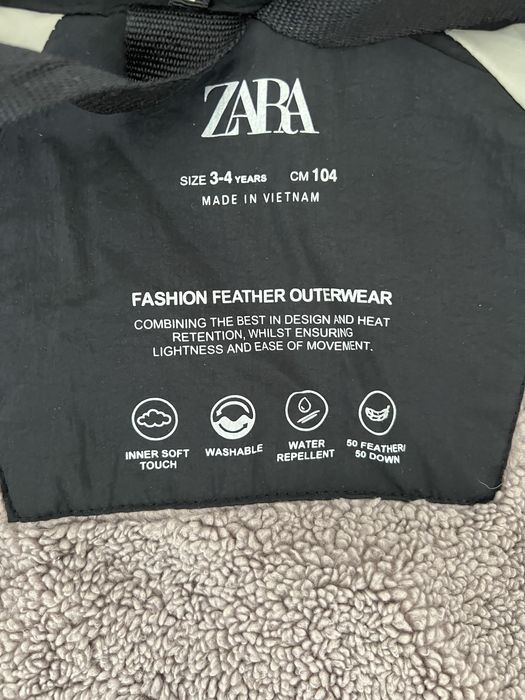 Теплий пуховик zara