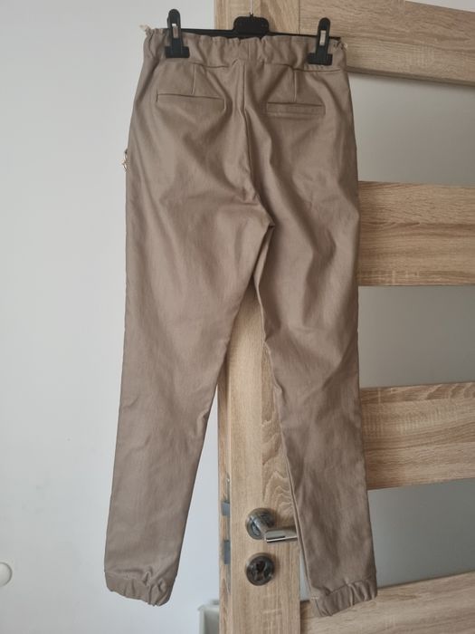 Spodnie woskowane Xana r.36/38, S, M piekny łancuch