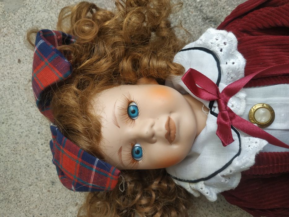 Bonecas em porcelana