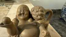 Bule antigo com forma de buda