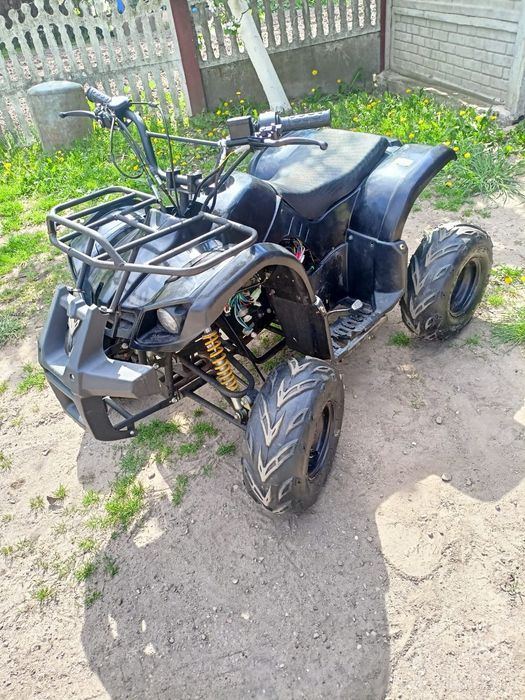 Quad dziecięcy 125 cm 9 km doinwestowany nowe opony elektryka