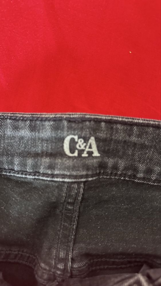 Calça flare preta da C&A