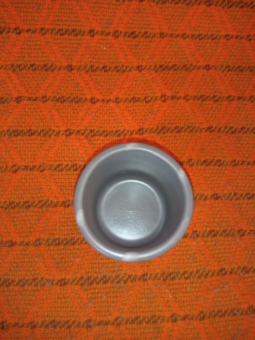 Świecznik szary.Oddam za darmo.