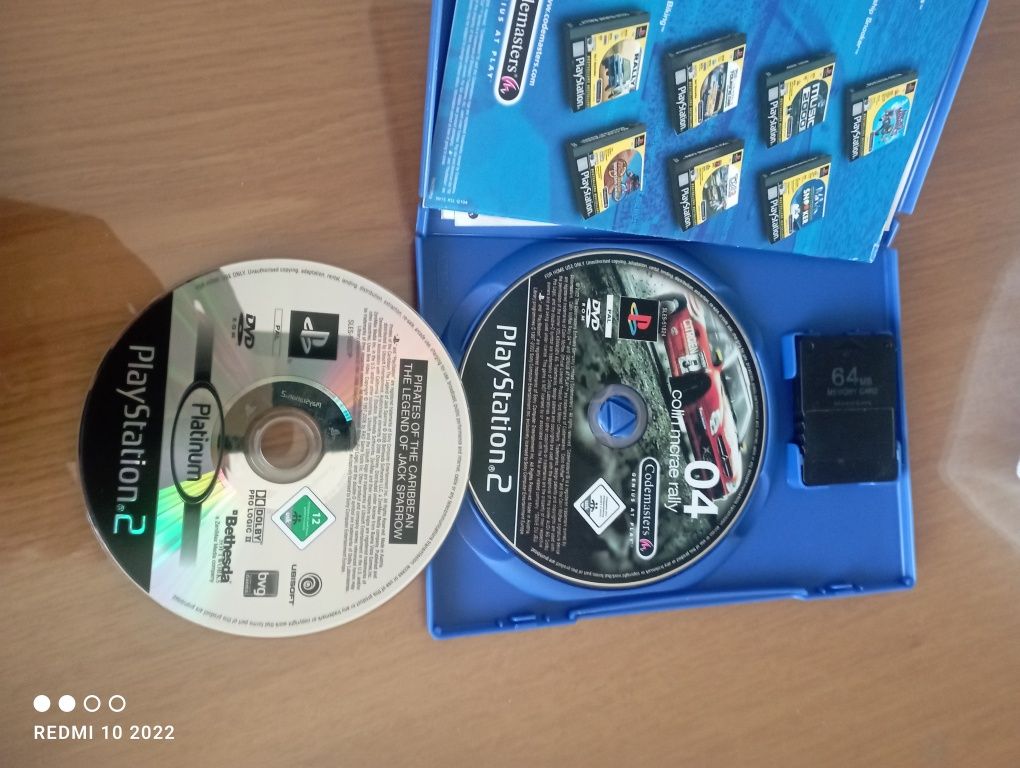 PlayStation 2 com 2 jogos