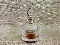 flakon kolekcjonerski + resztka perfum Scandal