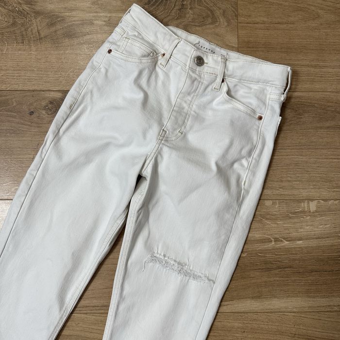 Білі джинси S розміру