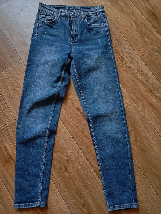 Джинси брюки жіночі