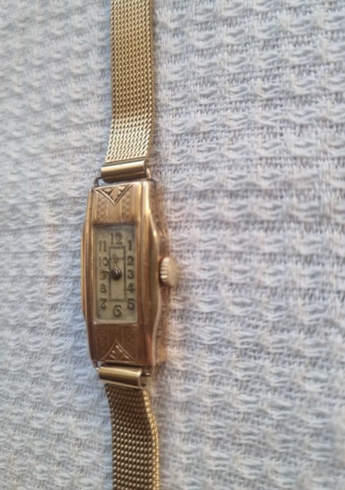 Złoty zegarek vintage Reville 14k