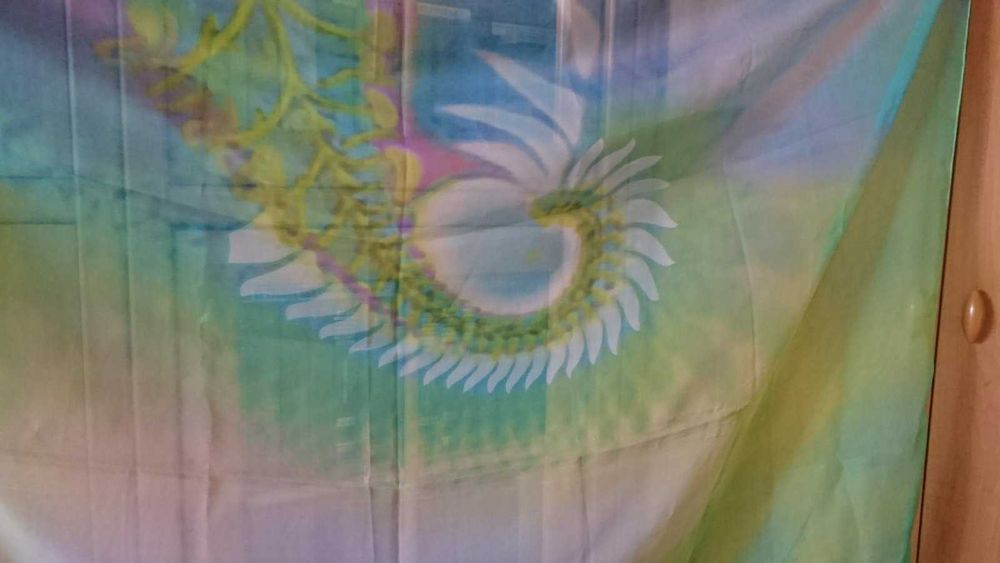 Парео. Легка накидка від сонця