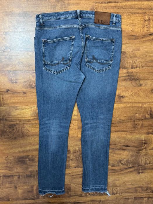 Spodnie jeansowe z dziurami jeansy skinny stretch rurki LTB W34 L