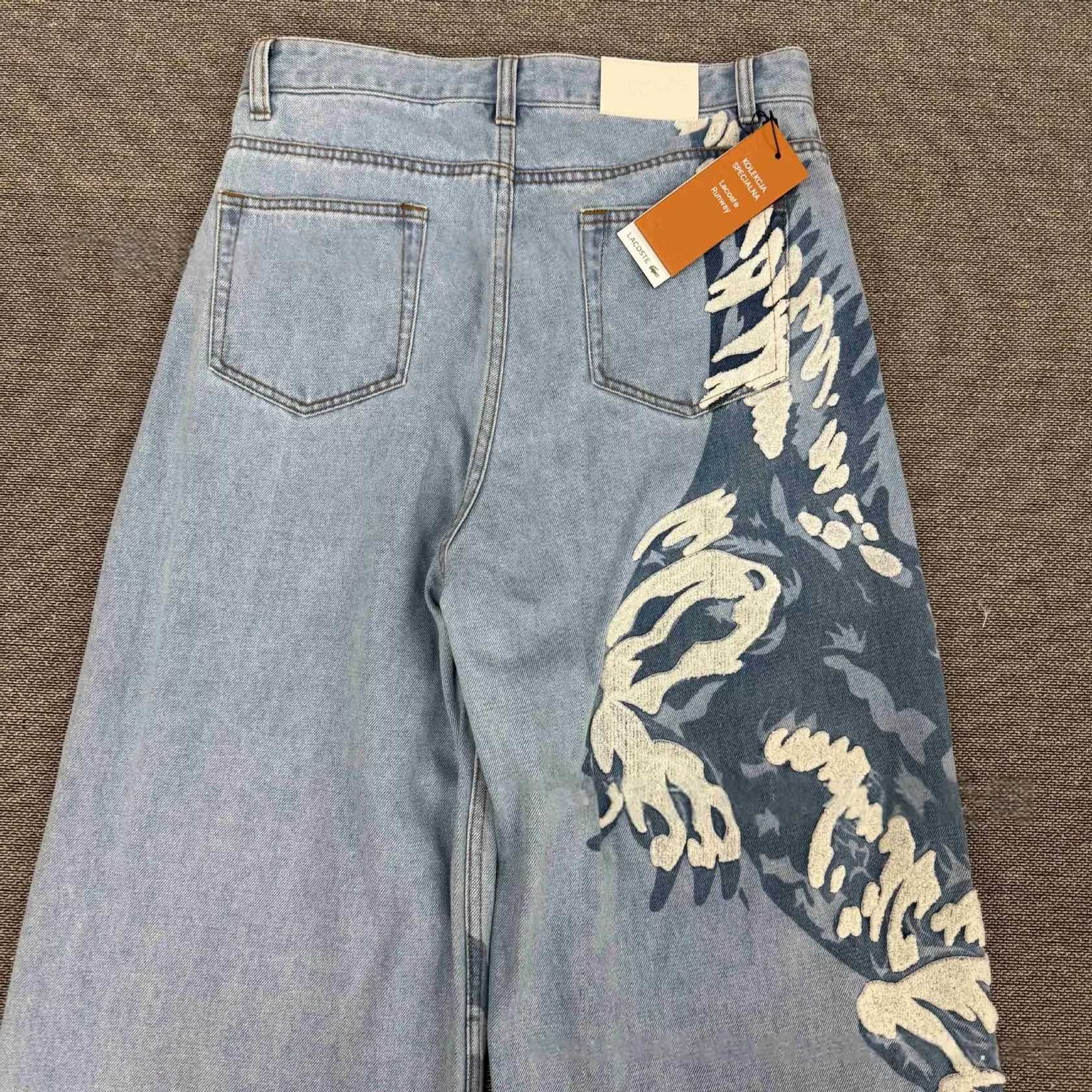 Джинси Lacoste з вишивкою