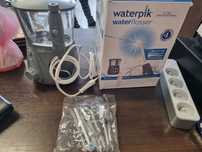 Irygator dentystyczny Waterpik z 7 końcówkami