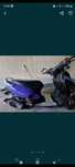 Moto scooter roxa