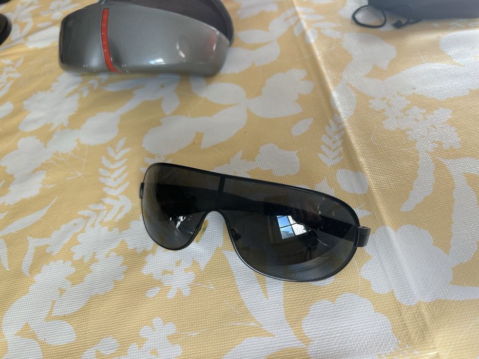 óculos de sol de homem PRADA