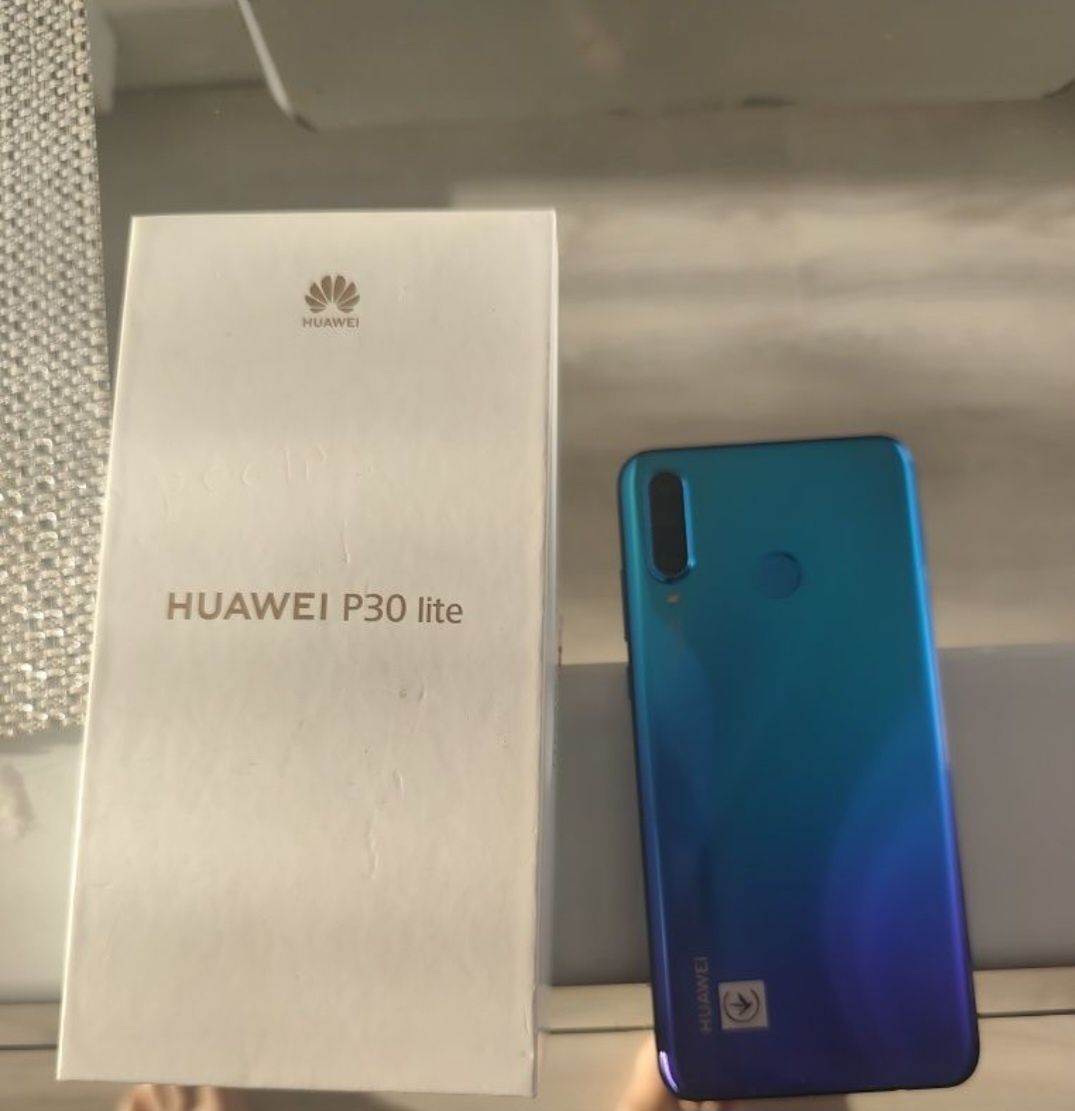 Witam sprzedam tel Huawei p30lit w bardzo dobrym stanie