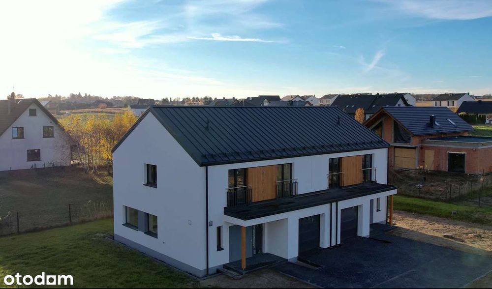 Nowoczesny i funkcjonalny dom 5-pokojowy z dużym ogrodem