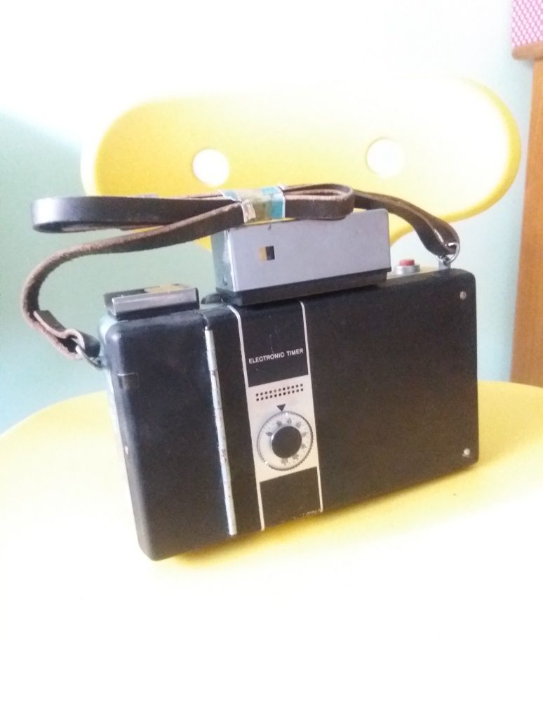 Maquina fotográfica poloroid antiga