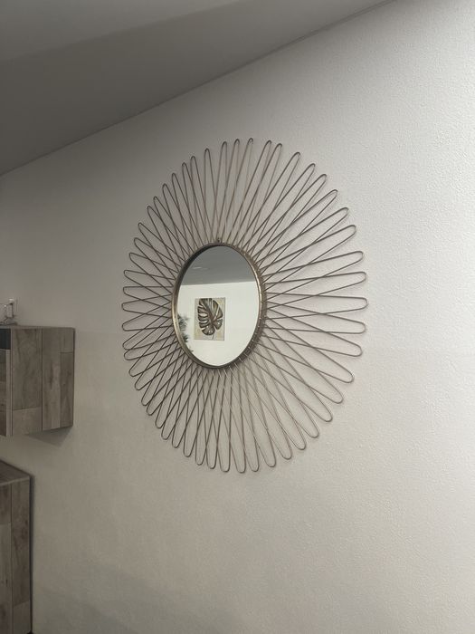 Espelho dourado de parede