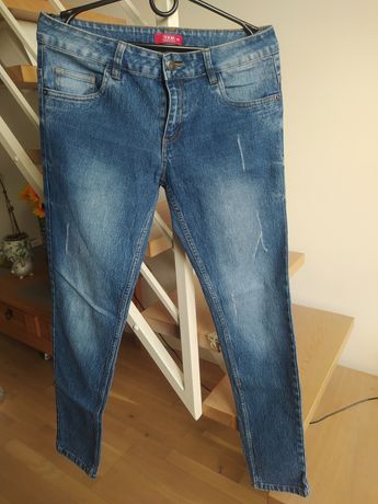 Spodnie jeansowe z przetarciami, niski stan, biodrówki, rozmiar 38