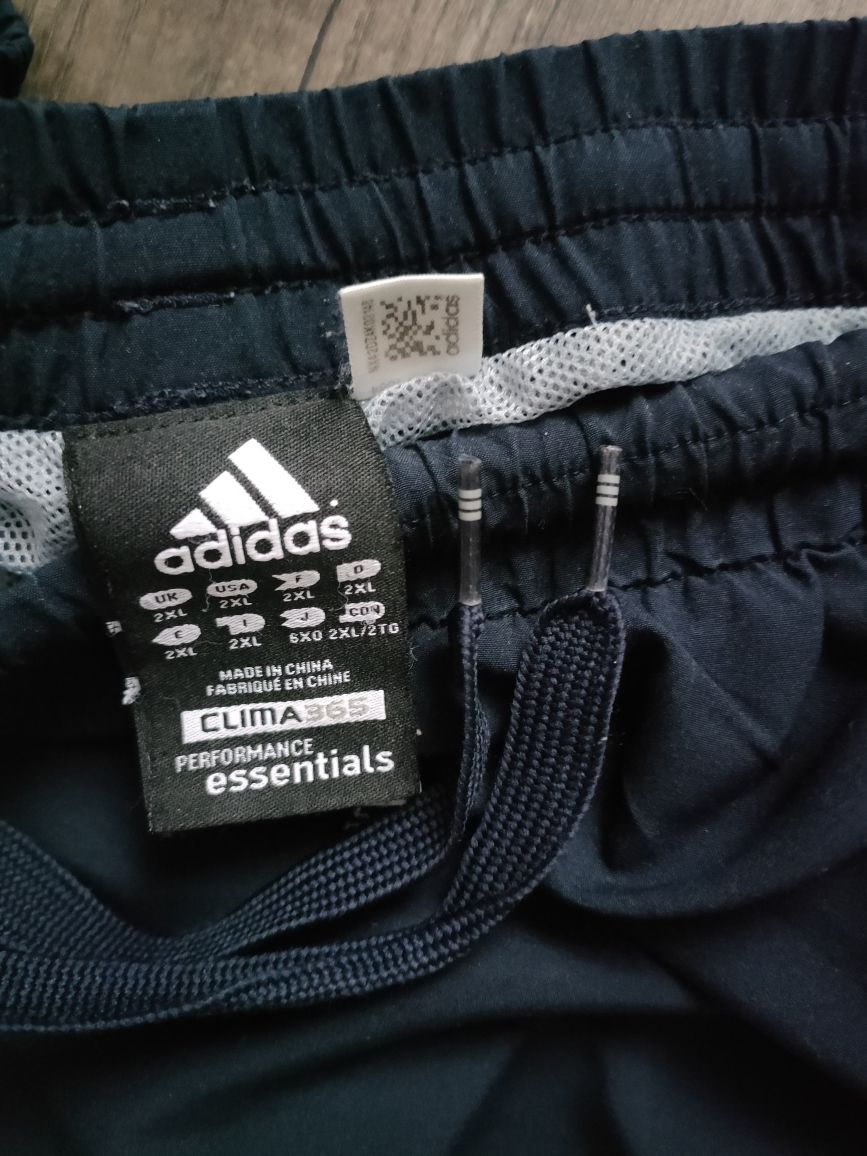 dresowe spodnie Adidas Climalite z podszewką i zamkami