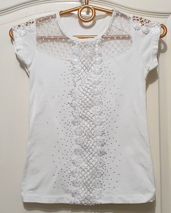 Футболки для девочки много