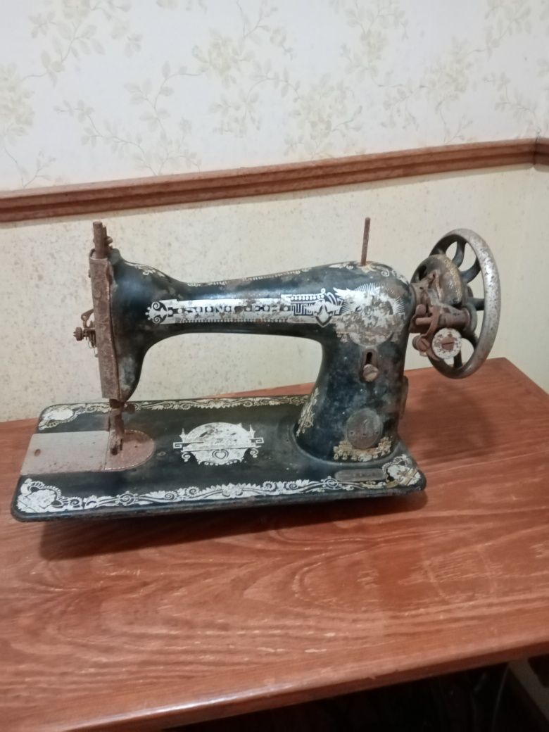 Máquina de costura singer
