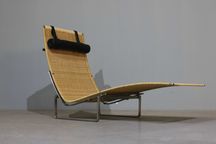 Poltrona Poul Kjaerholm modelo PK24 para Fritz Hansen